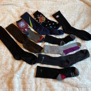 Lot of mismatched dark socks